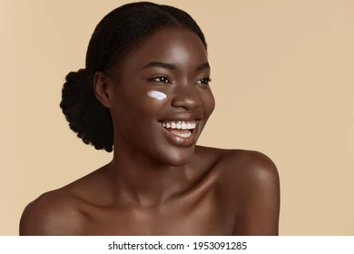 Woman applying cream